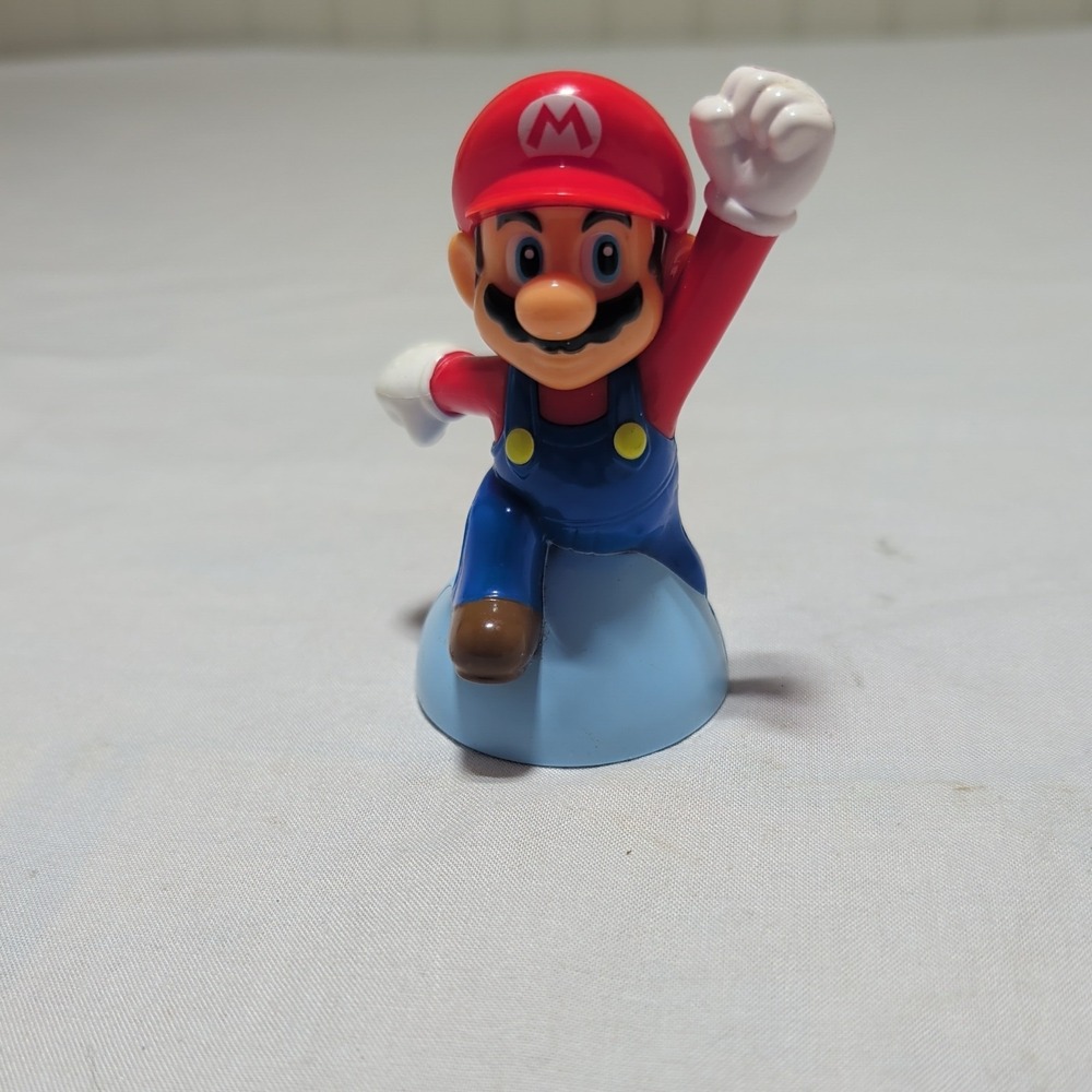 Vintage Nintendo Super Mario Bros 4" Figure On Blue Base Toy Battery Operated